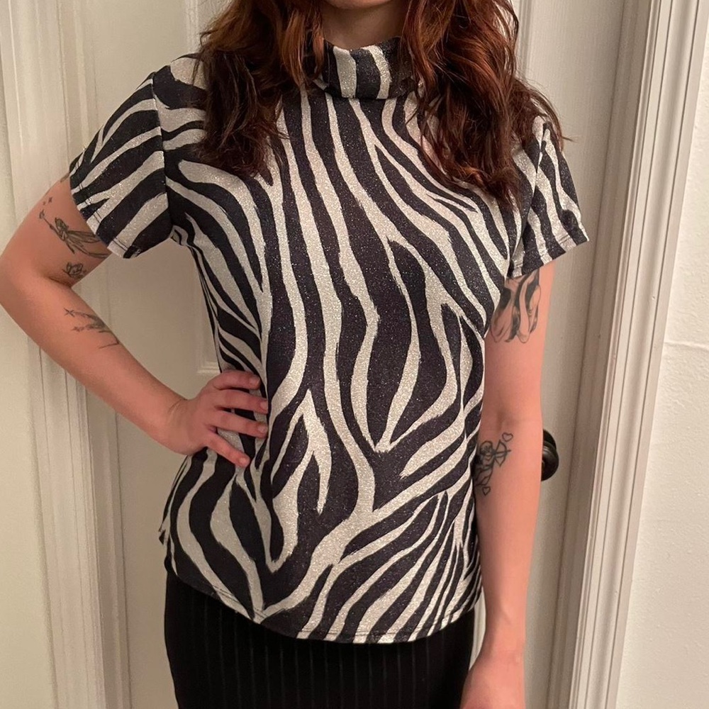 Blouse Animal Print Glitter Size  medium.